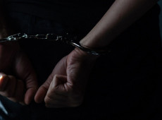 prisoner concept, Handcuffed hands of a prisoner in prison, Male prisoners were severely strained in the dark prison, violence