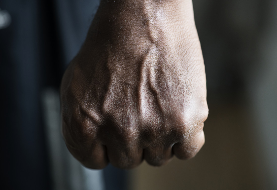  Closeup of a black hand in fist